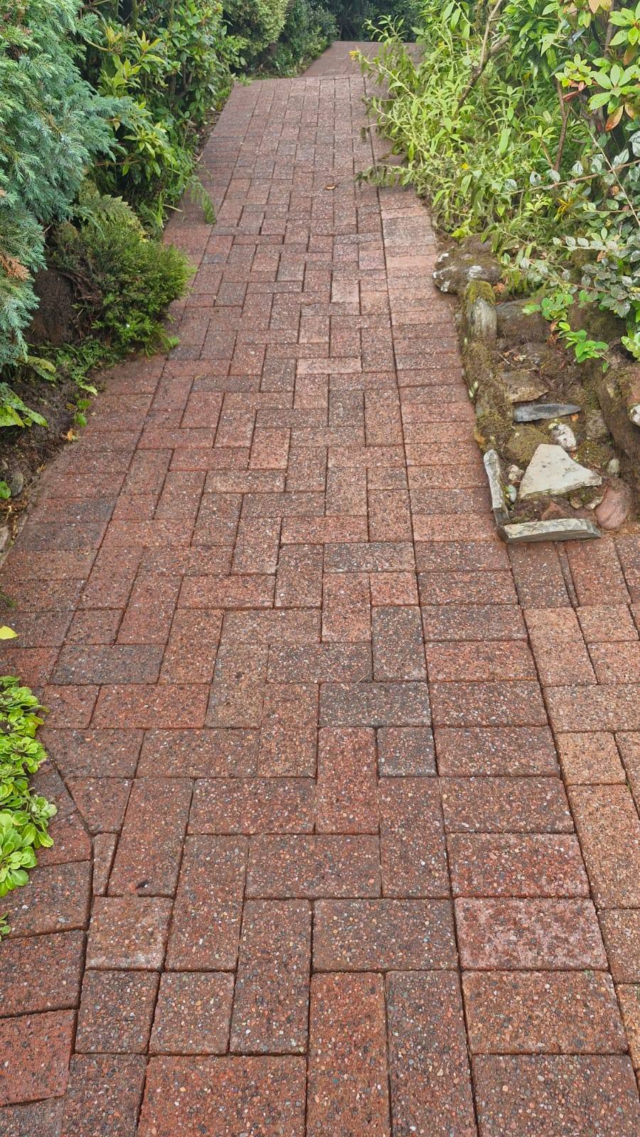 Pressure washing a garden block-paved path - Frosty Enterprises Ltd t/a Frostys Cleaning Services