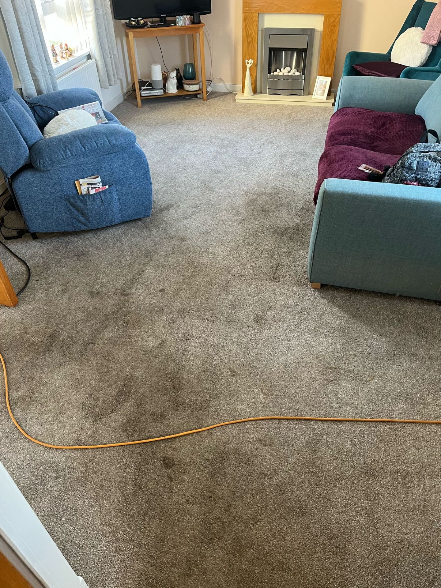 Cleaning a marked living room carpet - Frosty Enterprises Ltd t/a Frostys Cleaning Services