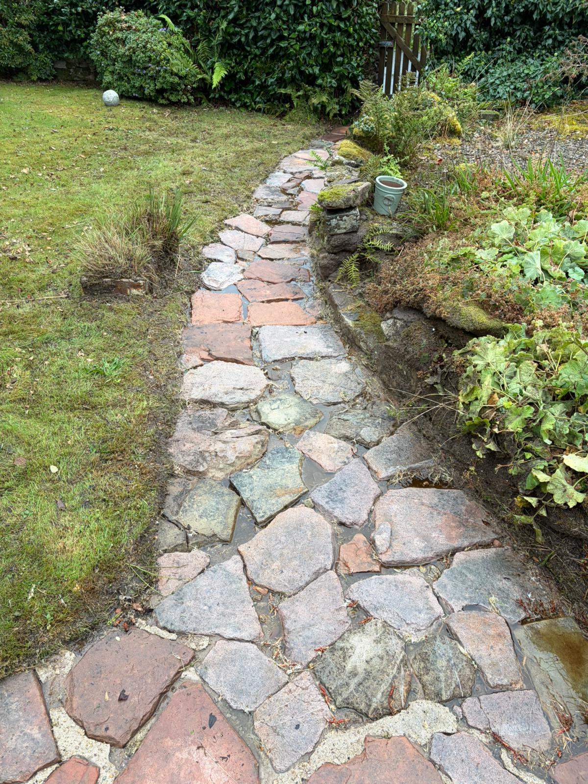 Revealing an overgrown stone garden path - Frosty Enterprises Ltd t/a Frostys Cleaning Services