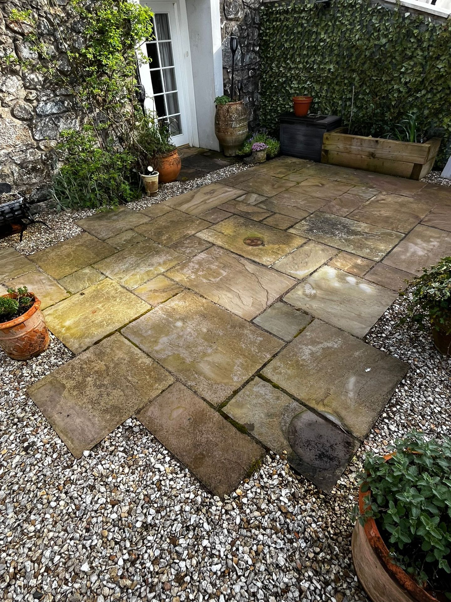 Softwashing a courtyard patio - Frosty Enterprises Ltd t/a Frostys Cleaning Services