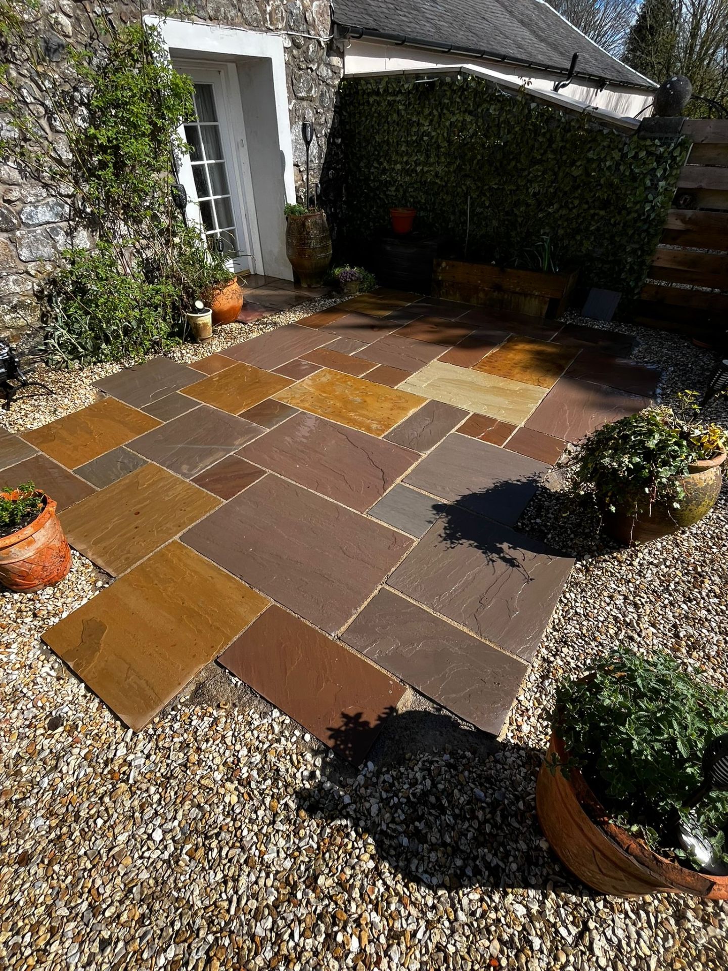 Softwashing a courtyard patio - Frosty Enterprises Ltd t/a Frostys Cleaning Services