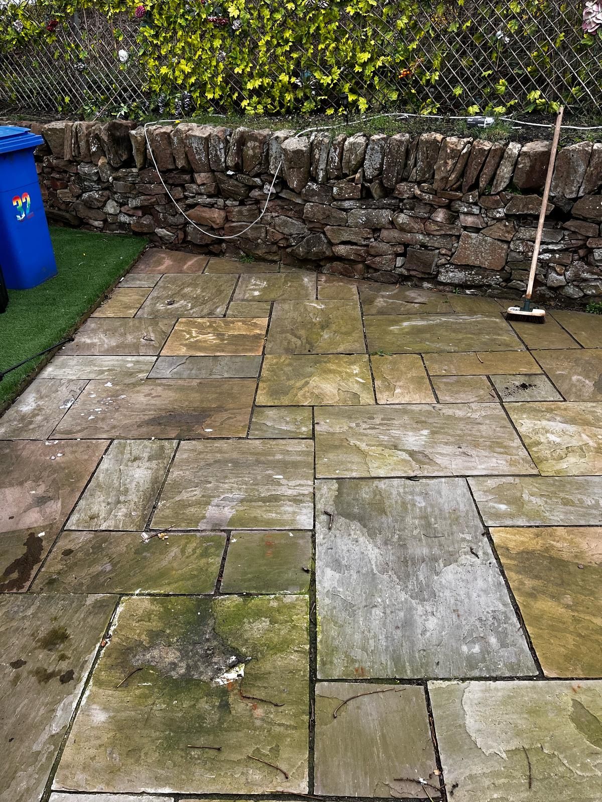 Softwashing paving beside a garden wall - Frosty Enterprises Ltd t/a Frostys Cleaning Services