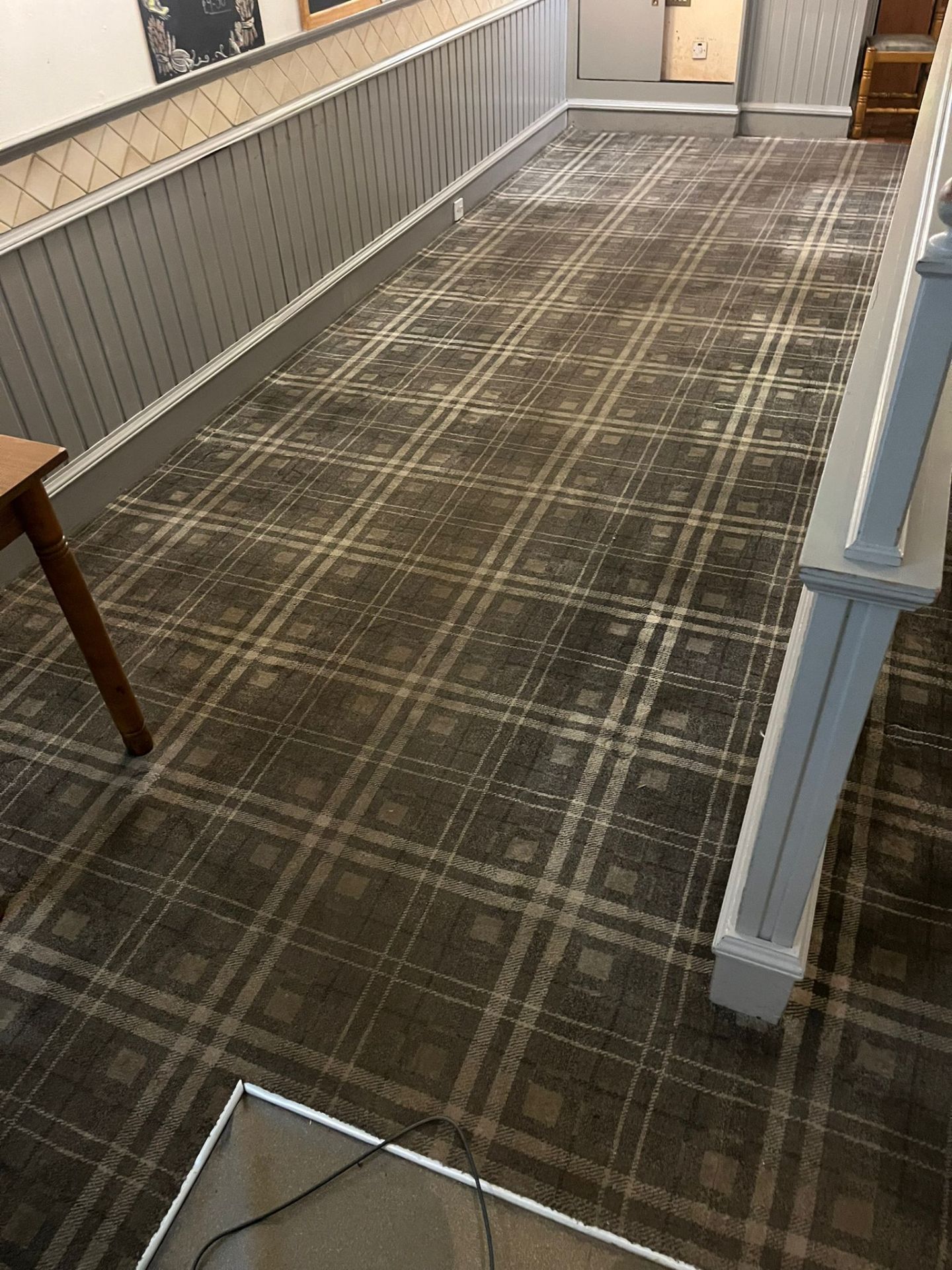 Cleaning a patterned carpet in a seating area - Frosty Enterprises Ltd t/a Frostys Cleaning Services