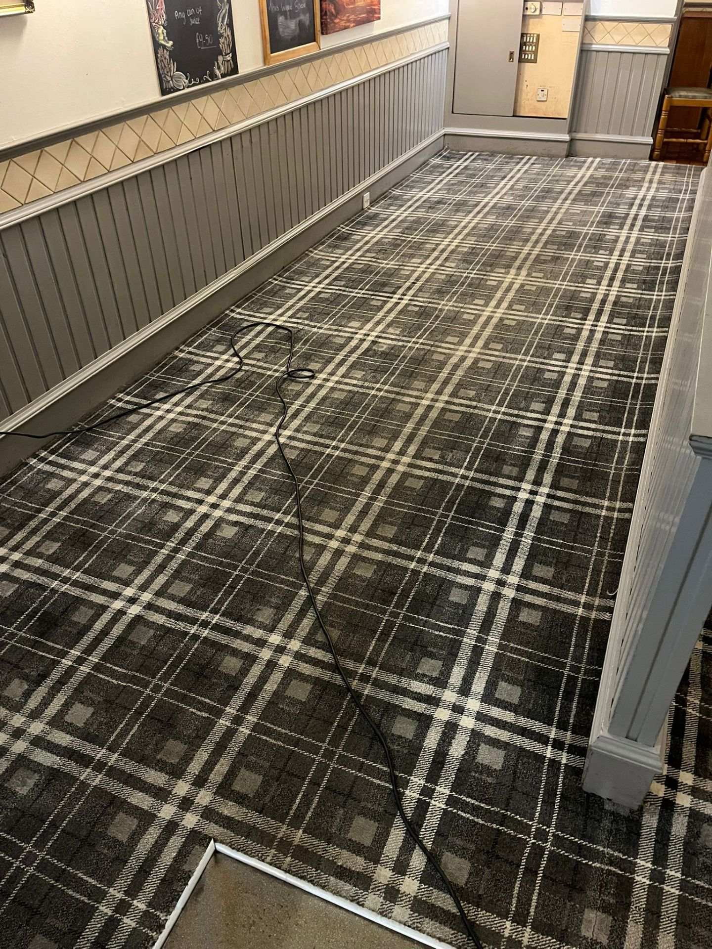 Cleaning a patterned carpet in a seating area - Frosty Enterprises Ltd t/a Frostys Cleaning Services