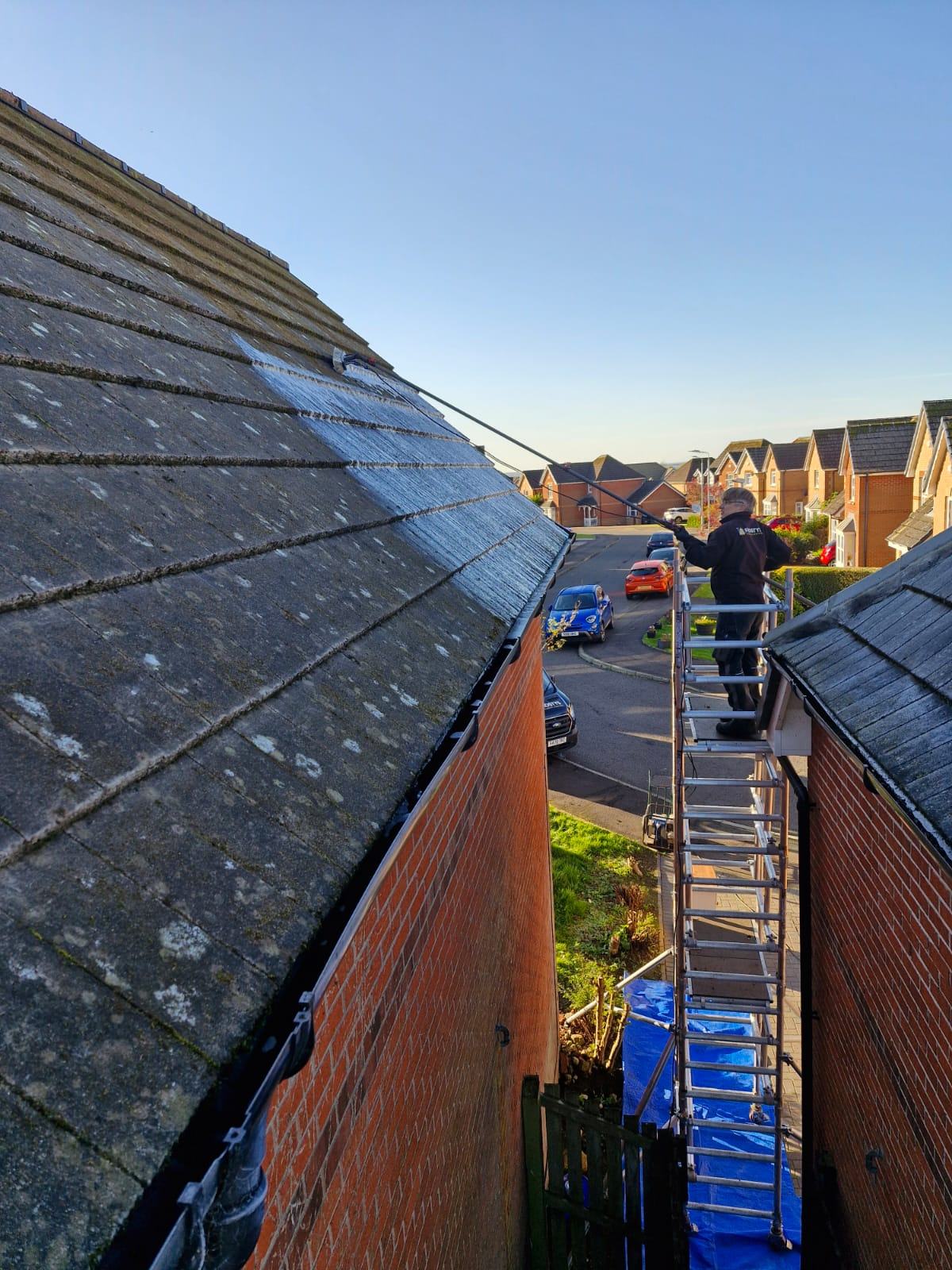Roof cleaning from an access tower - Frosty Enterprises Ltd t/a Frostys Cleaning Services