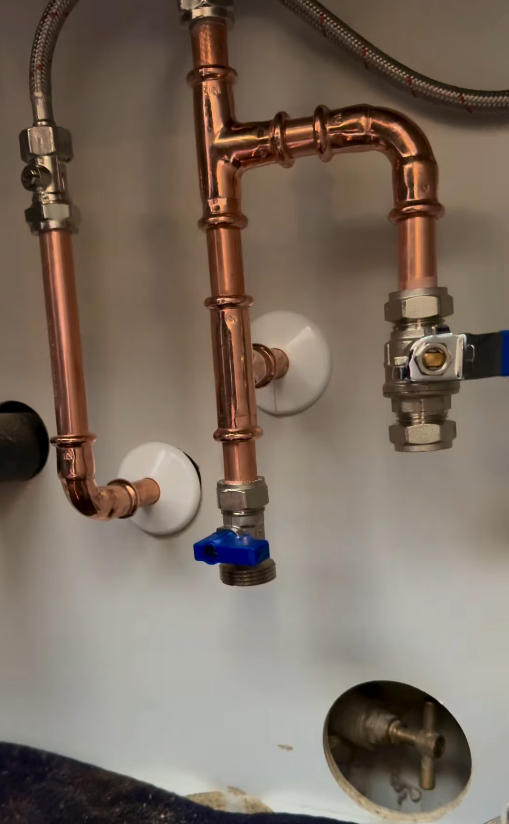 Under the kitchen sink - M J Tiff Plumbing and Heating